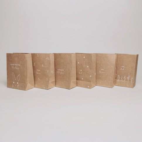 Geschenktüten Ostern aus Papier mit Hasen, Blumen und liebevollen Osterbotschaften