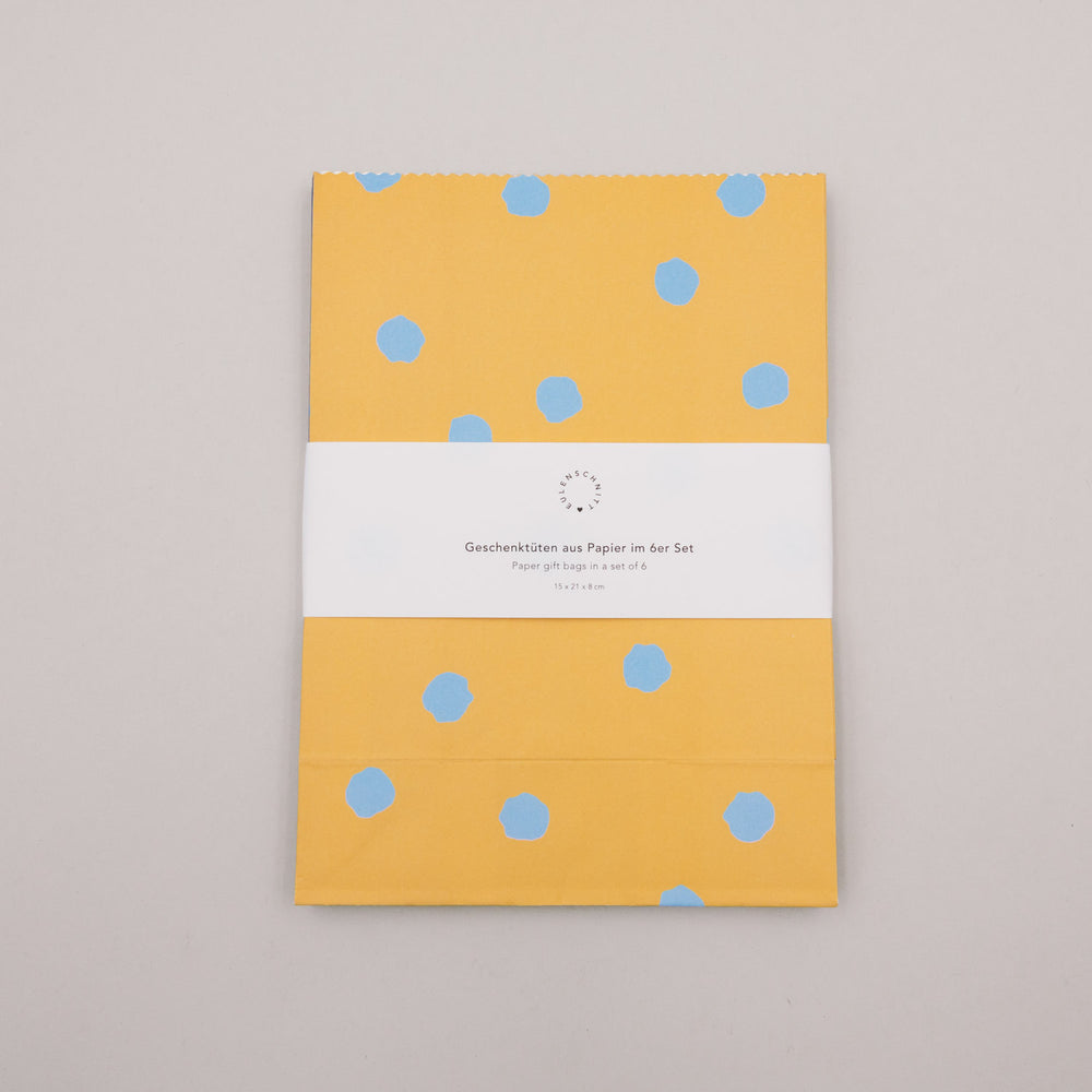 Gefaltetes Papiertüten-Set mit Punkten in Gelb, Teil des 6er Geschenkbeutel-Sets