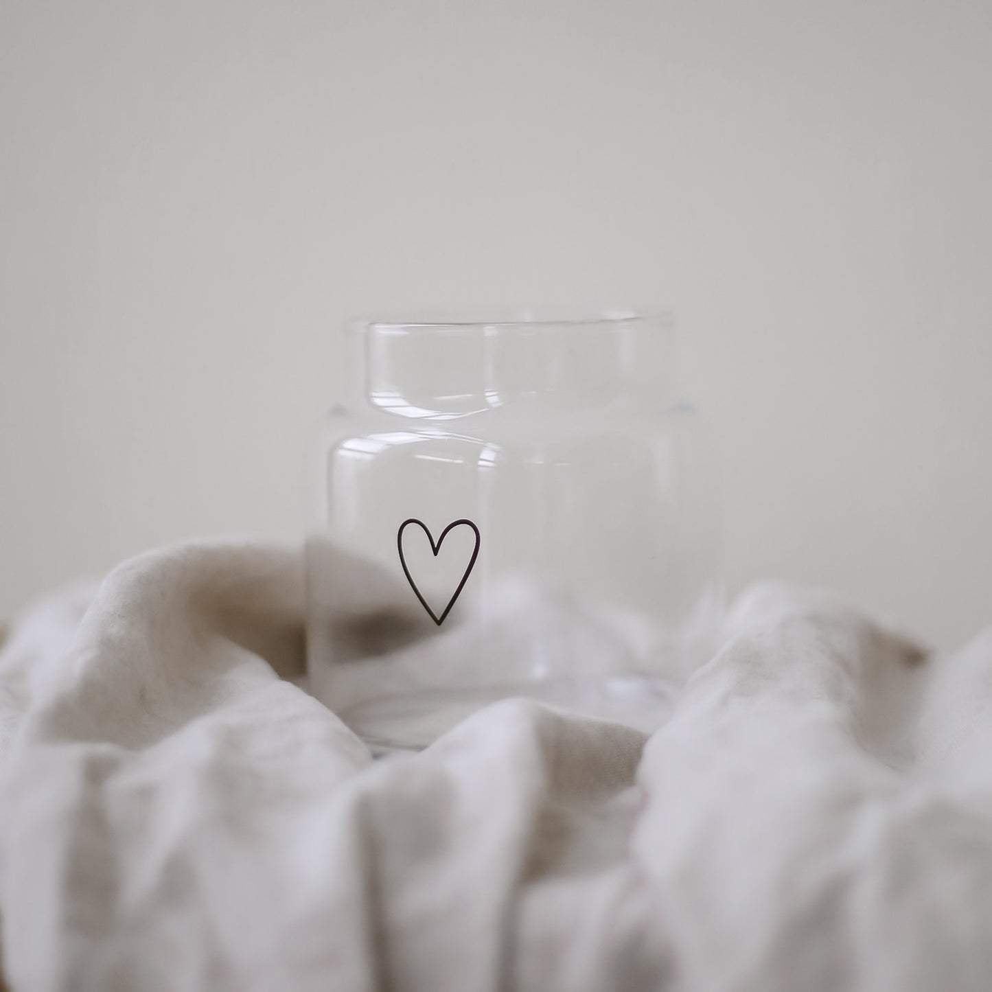 Vase en verre avec un coeur