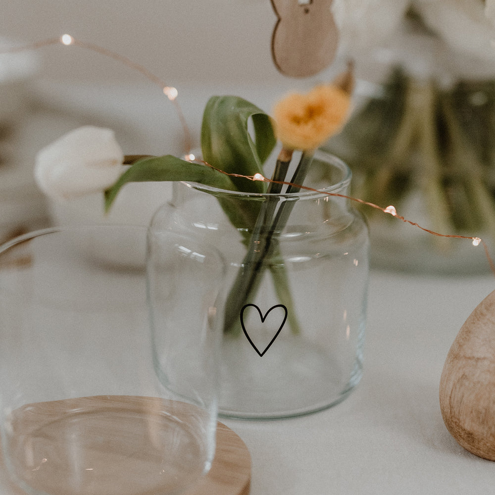 Vase en verre avec un coeur